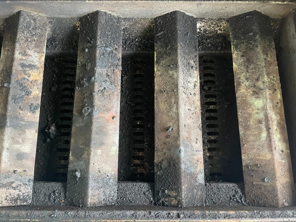 A grill before Xtreme Grill Clean cleaned and serviced it